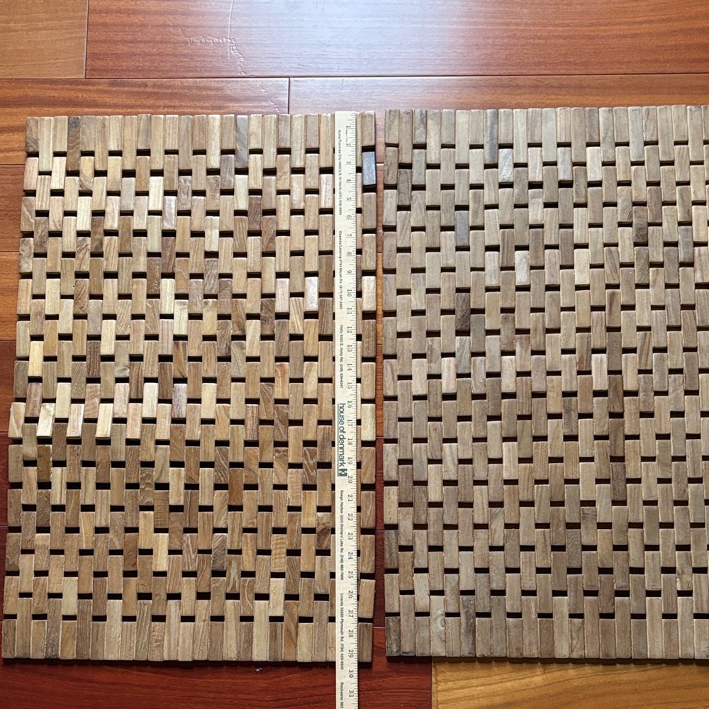 A pair of Teak Bath Mats